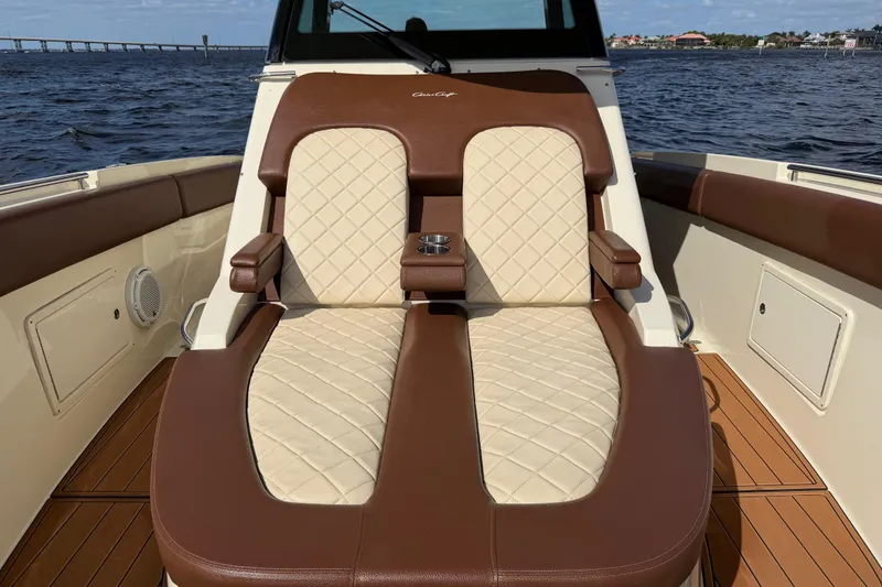Slide: The Image of Luxurious seating on 2021 Chris-Craft Catalina 34 boat with quilted upholstery. - 32