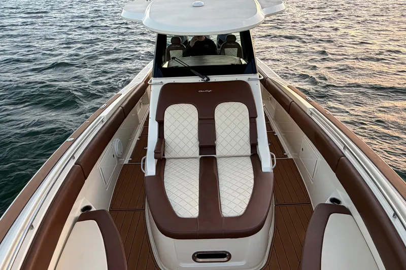Slide: The Image of 2021 Chris-Craft Catalina 34 boat with elegant seating on open water. - 33