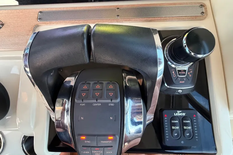Slide: The Image of Control panel of a 2021 Chris-Craft Catalina 34 boat with throttle and joystick. - 9