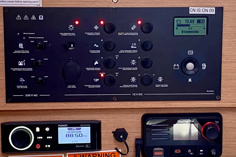 Slide: The Image of Nav Desk featuring VHF, AM/FM Radio, and Electrical Panel systems. - 16