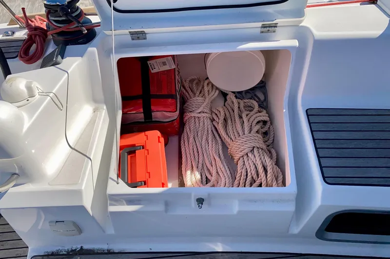Slide: The Image of Seat locker with Tow line, extra Dock lines, and Safety Gear. - 31