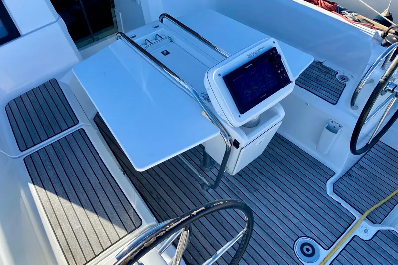Slide: The Image of Fixed Cockpit Table and Centerline Multifunction Raymarine Display. - 34
