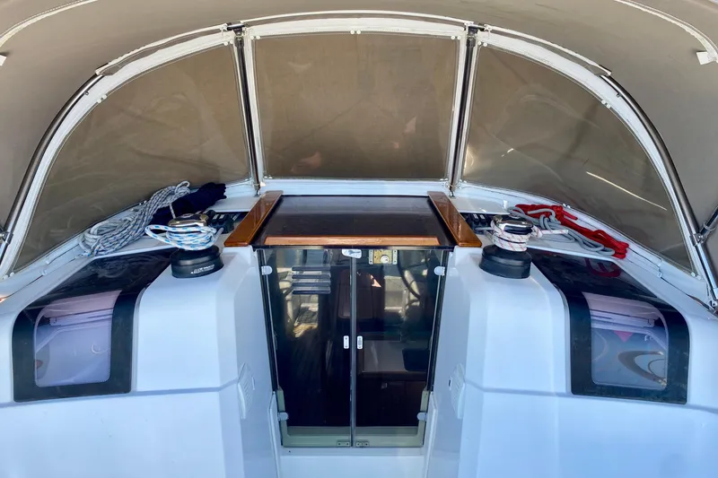 Slide: The Image of Cabin Top with Lewmar 2-speed winches, Companionway entry and Port & Starboard Cabin Hatches & lites - 7