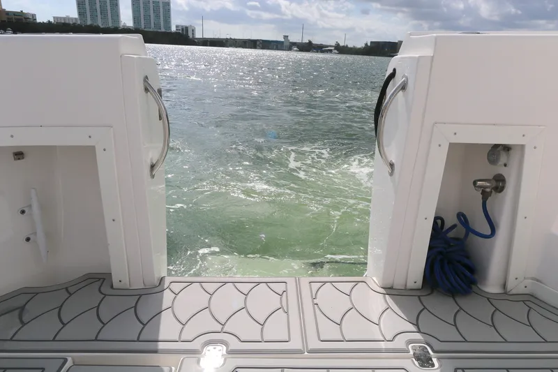 Slide: The Image of 2012 Intrepid 475 Sport Yacht deck view with ocean backdrop. - 15