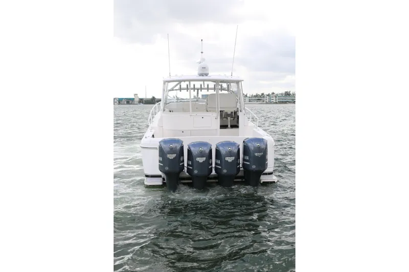 Slide: The Image of 2012 Intrepid 475 Sport Yacht with four Yamaha outboard engines on water. - 20