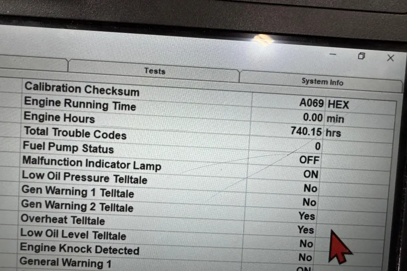 Slide: The Image of Display screen showing system diagnostics for a 1998 Mariah 272 Shabah boat. - 15