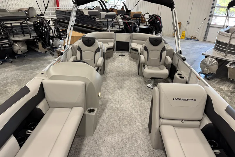 Slide: The Image of 2026 Berkshire 24 RFX LE pontoon boat interior with luxurious seating and modern design. - 7