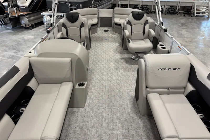 Slide: The Image of 2026 Berkshire 24RFX LE pontoon boat interior with luxurious seating and modern design. - 8