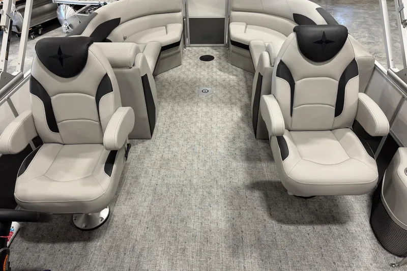 Slide: The Image of Luxurious interior of 2026 Berkshire 24RFX LE pontoon boat with plush seating. - 9