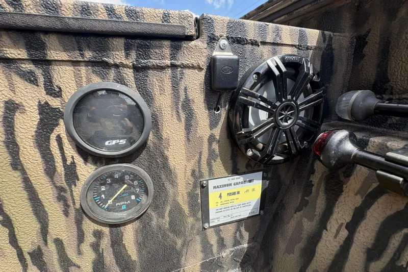 Slide: The Image of 2022 Edge Duck Boats HPSD 1656DB dashboard with GPS, RPM gauge, and speaker. - 13