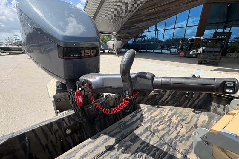 Slide: The Image of 2022 Edge Duck Boats HPSD 1656DB with Yamaha 130 engine, camo interior, outdoor setting. - 17