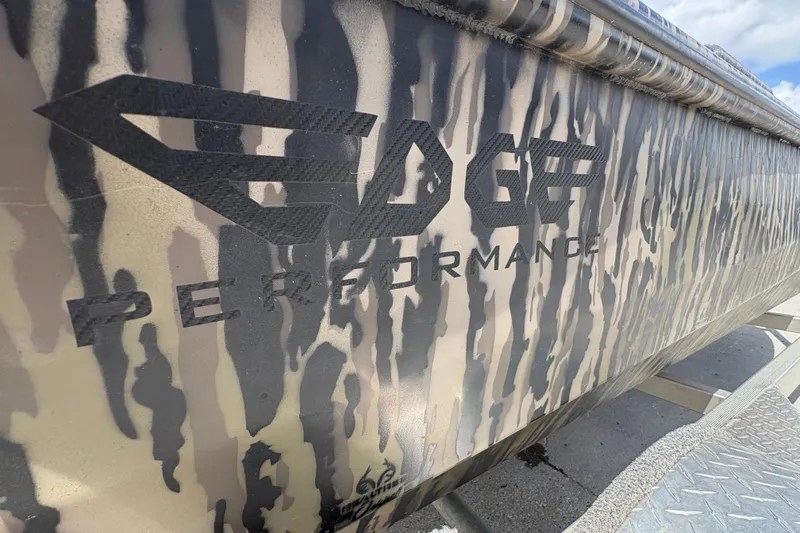 Slide: The Image of 2022 Edge Duck Boats HPSD 1656DB with camouflage design and "Edge Performance" branding. - 19