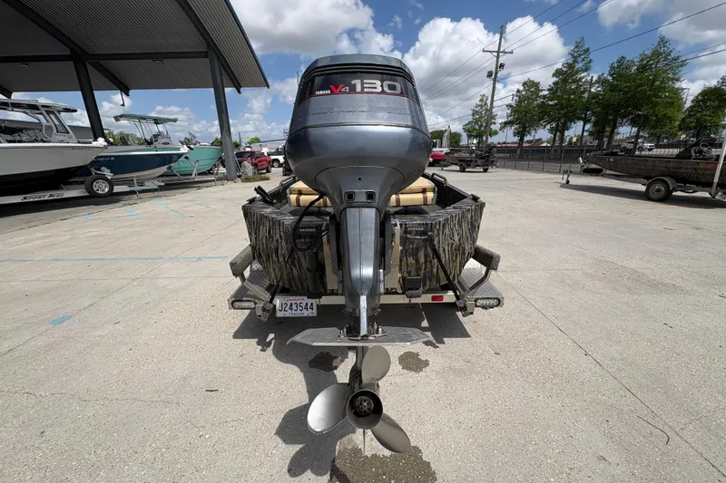 Slide: The Image of 2022 Edge Duck Boats HPSD 1656DB with Yamaha V130 engine in a boatyard. - 4