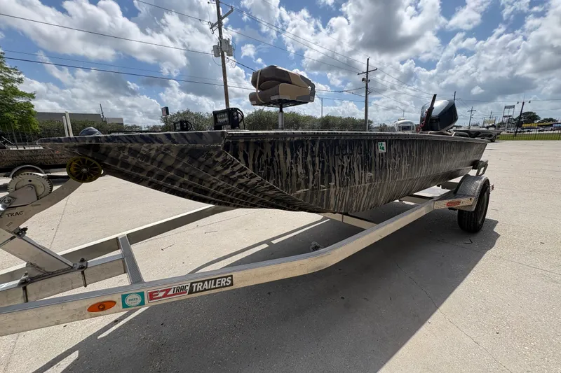 Slide: The Image of 2022 Edge Duck Boats HPSD 1656DB on trailer under cloudy sky. - 7