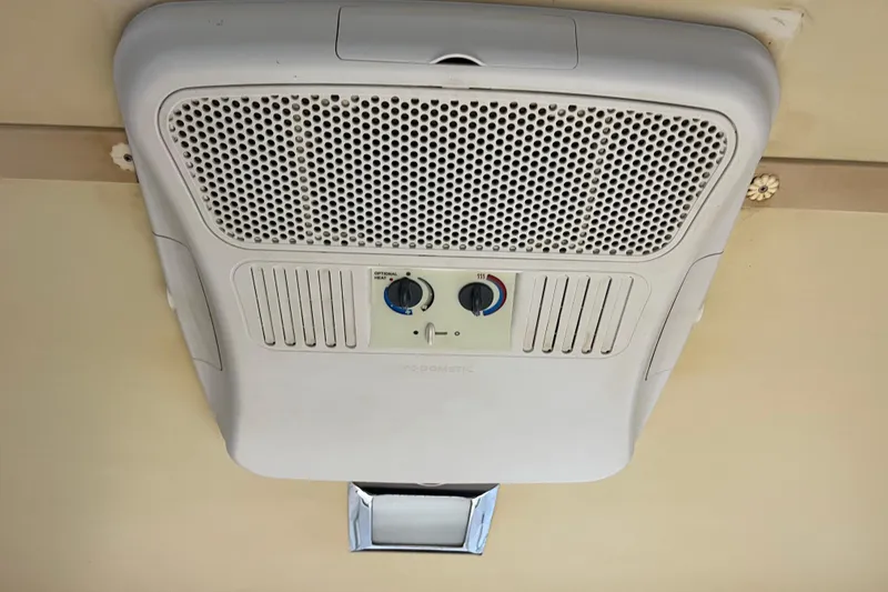 Slide: The Image of Ceiling-mounted air conditioning unit, Gibson model 44, 1990, with adjustable controls. - 30