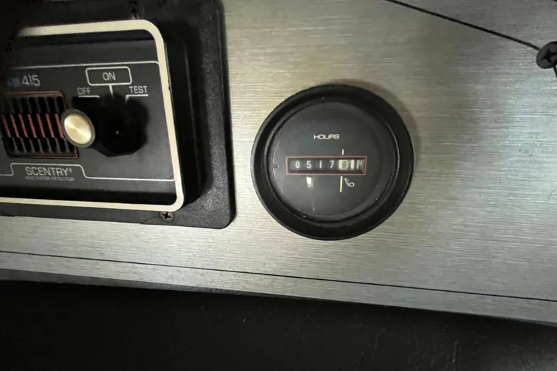 Slide: The Image of Control panel with hour meter reading 5178.1 hours on a 1990 Gibson model 44. - 9