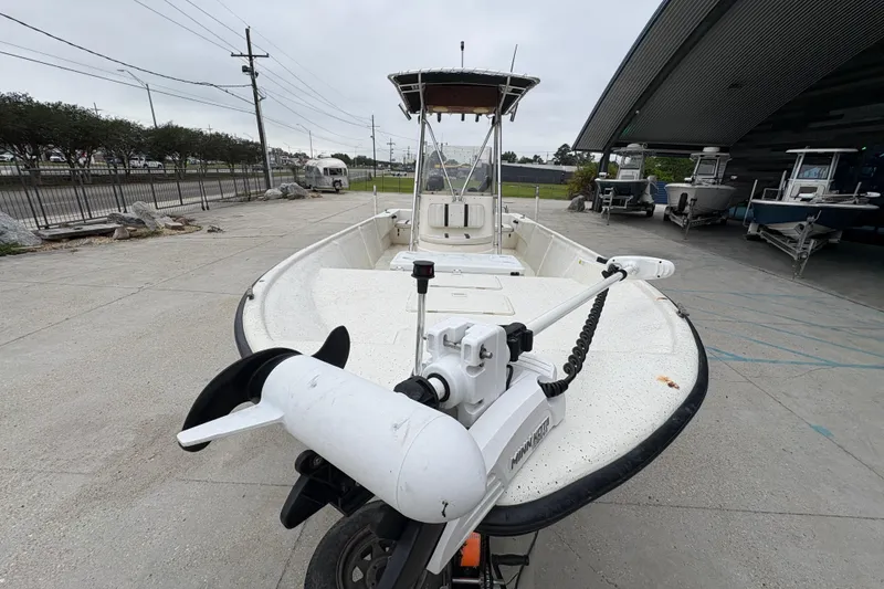 Slide: The Image of 1998 Hydra-Sports 22 Ocean CC boat with trolling motor, parked outdoors. - 10