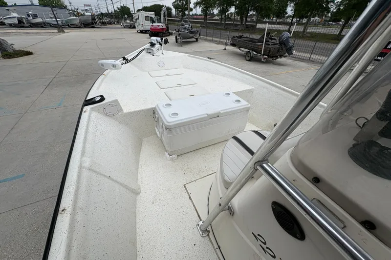 Slide: The Image of 1998 Hydra-Sports 22 Ocean CC boat with cooler on deck, parked in marina. - 16
