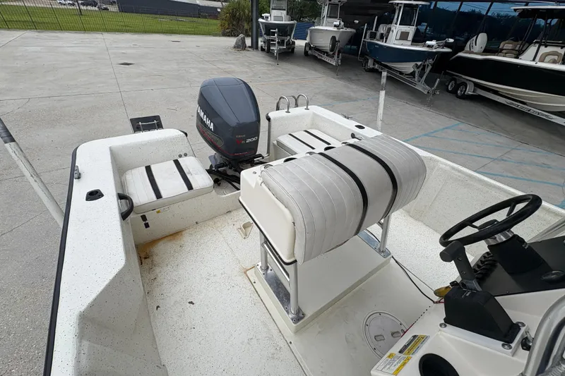 Slide: The Image of 1998 Hydra-Sports 22 Ocean CC boat with Yamaha V6 200 outboard motor, docked outdoors. - 19