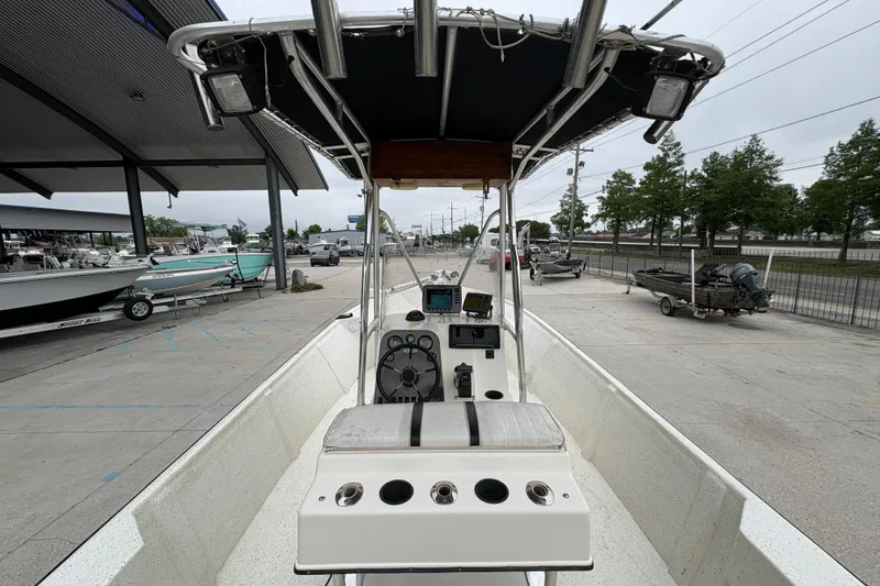 Slide: The Image of 1998 Hydra-Sports 22 Ocean CC boat interior with steering console and canopy. - 21