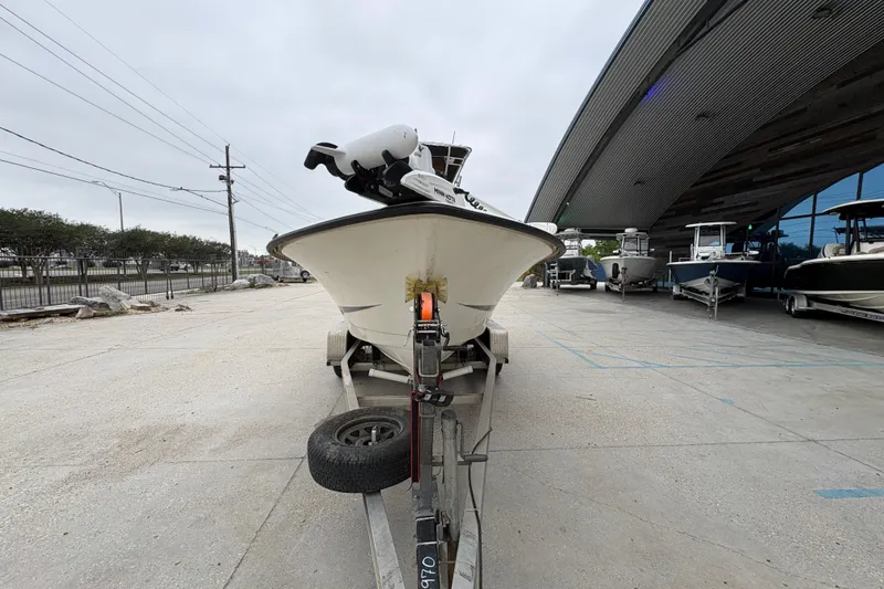 Slide: The Image of 1998 Hydra-Sports 22 Ocean CC boat on trailer outside a showroom. - 9