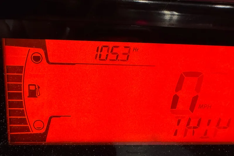 Slide: The Image of Dashboard display of 2023 Sea-Doo Switch Cruise 21 showing 105.3 hours and 0 MPH. - 18