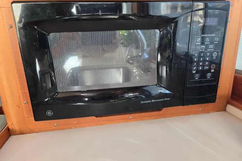 Slide: The Image of Built-in GE microwave oven on a 1992 Grand Banks 46 Classic yacht. - 27