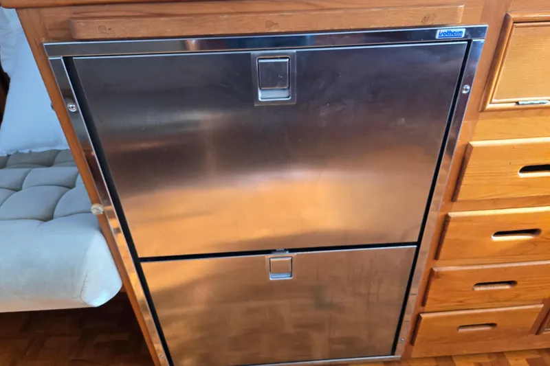 Slide: The Image of Stainless steel fridge on 1992 Grand Banks 46 Classic yacht interior. - 28