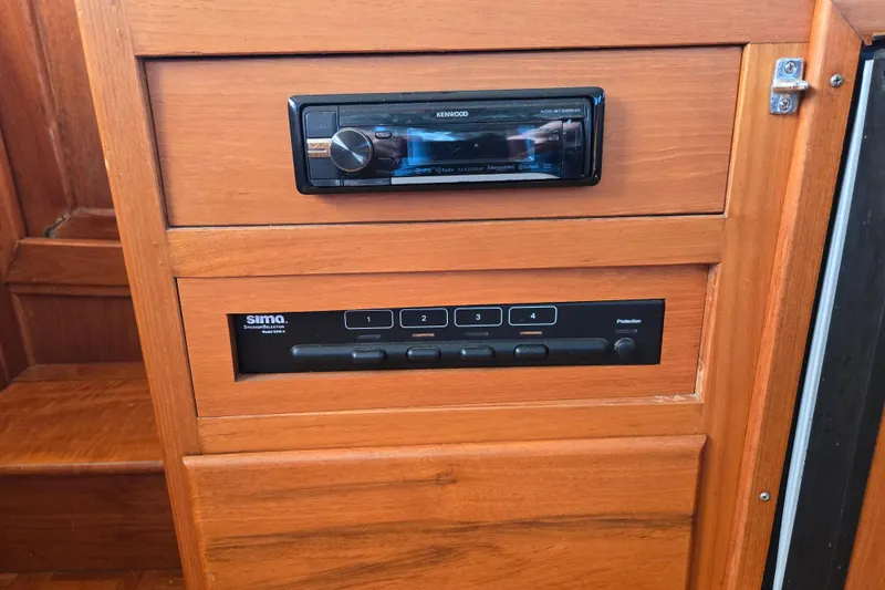 Slide: The Image of Audio panel in Grand Banks 46 Classic yacht, year 1992. - 32