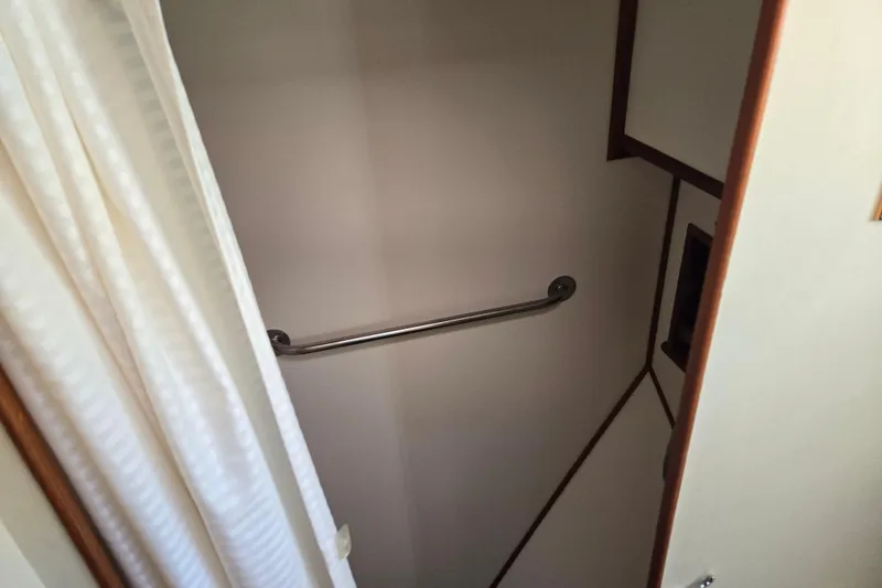 Slide: The Image of Shower area with grab bar on 1992 Grand Banks 46 Classic yacht. - 64