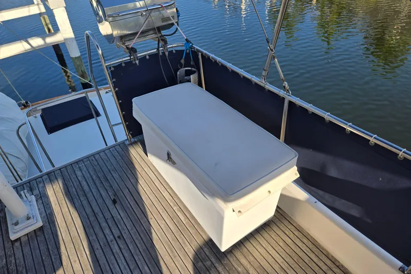 Slide: The Image of Deck area of 1992 Grand Banks 46 Classic yacht with storage box and railing. - 83