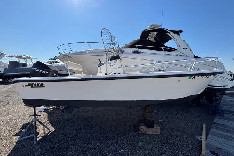 Slide: The Image of 2006 Mako 171 Center Console boat with Mercury engine on display. - 11