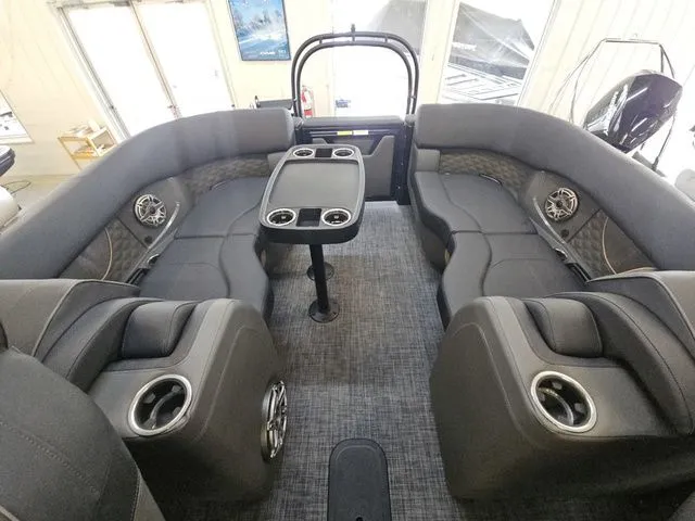 Slide: The Image of Interior of 2026 Godfrey Sanpan 2500 SBC with luxurious seating. - 12
