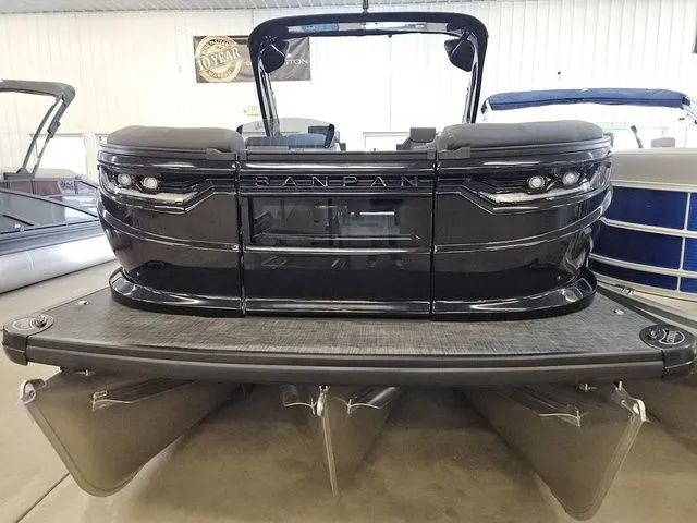Slide: The Image of 2026 Godfrey Sanpan 2500 SBC pontoon boat in a showroom. - 7
