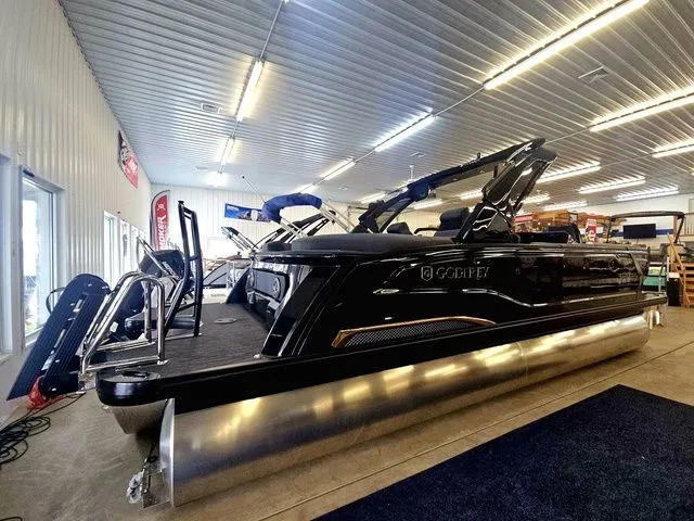 Slide: The Image of Luxurious Godfrey Sanpan 2500 SBC pontoon boat, 2026 model, in a showroom. - 8