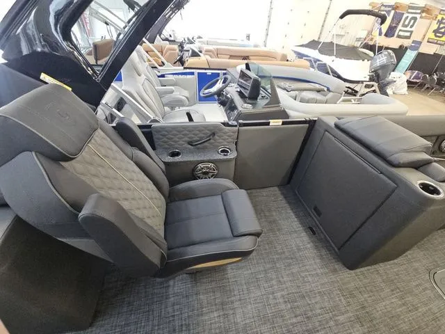 Slide: The Image of Interior of 2026 Godfrey Sanpan 2500 SBC with luxurious seating. - 9