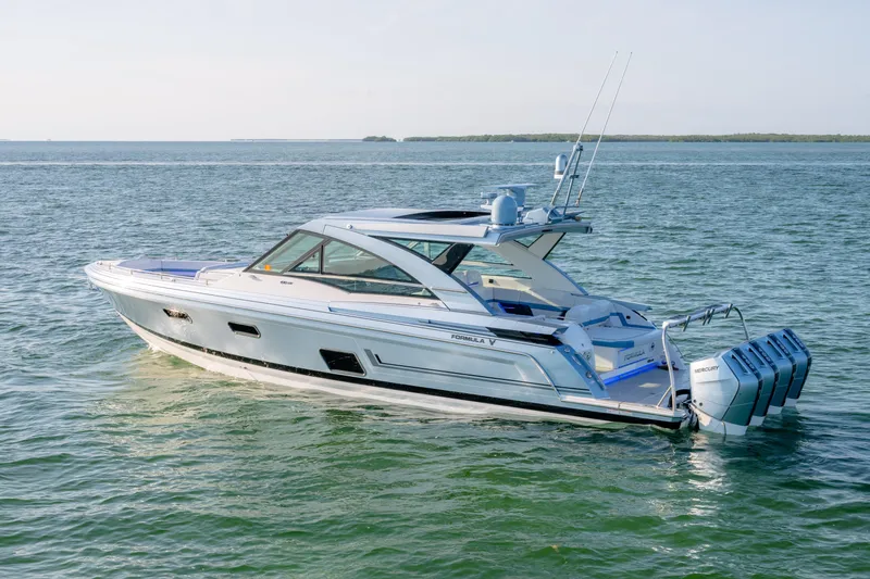Slide: The Image of 2025 Formula 430 Super Sport Crossover yacht cruising on open water. - 100