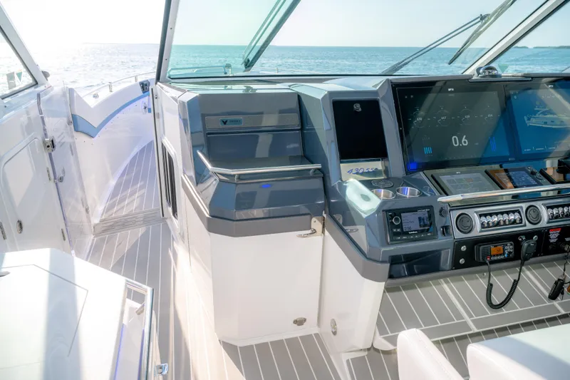 Slide: The Image of 2025 Formula 430 Super Sport Crossover cockpit with advanced navigation systems and sleek design. - 30