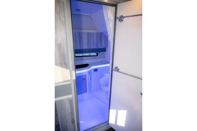 Slide: The Image of Modern bathroom interior in 2025 Formula 430 Super Sport Crossover with ambient lighting. - 44