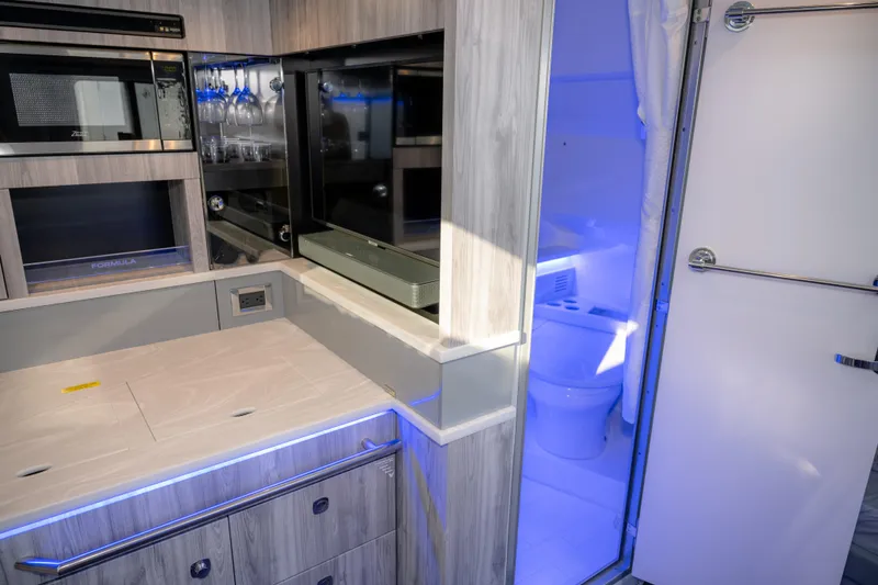 Slide: The Image of Interior of 2025 Formula 430 Super Sport Crossover with modern kitchen and bathroom. - 47