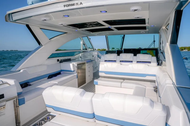 Slide: The Image of Luxurious interior of 2025 Formula 430 Super Sport Crossover yacht with spacious seating. - 59