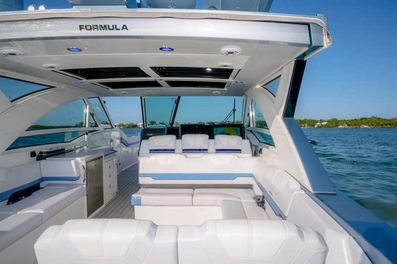 Slide: The Image of 2025 Formula 430 Super Sport Crossover luxury boat interior on a sunny day. - 61