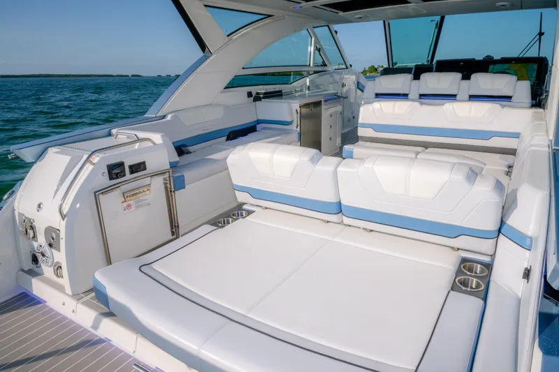 Slide: The Image of Luxurious 2025 Formula 430 Super Sport Crossover boat interior with spacious seating and modern amenities. - 66