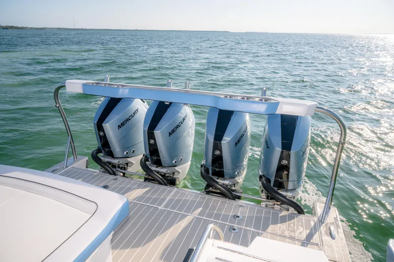 Slide: The Image of 2025 Formula 430 Super Sport Crossover with Mercury outboard engines on open water. - 68