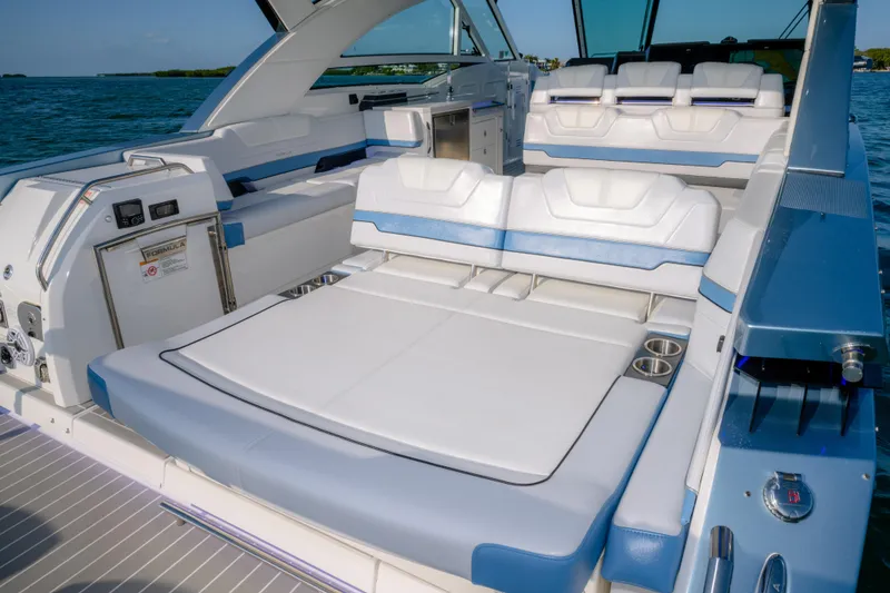 Slide: The Image of 2025 Formula 430 Super Sport Crossover luxury boat interior with plush seating and modern amenities. - 70