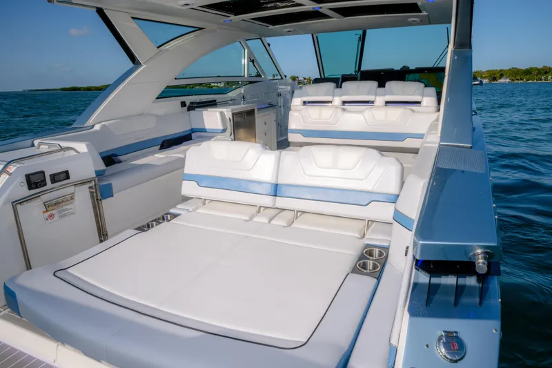 Slide: The Image of 2025 Formula 430 Super Sport Crossover luxury boat interior on open water. - 71