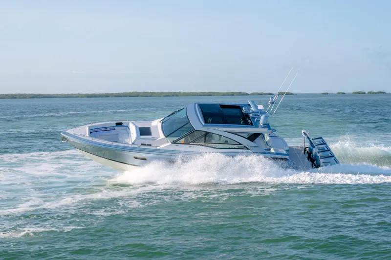 Slide: The Image of 2025 Formula 430 Super Sport Crossover cruising on open water. - 76