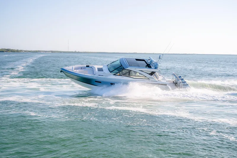 Slide: The Image of 2025 Formula 430 Super Sport Crossover cruising on open water. - 77