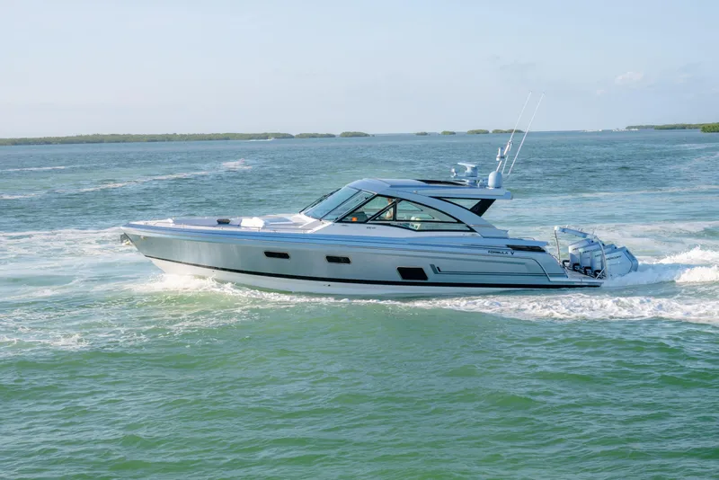 Slide: The Image of 2025 Formula 430 Super Sport Crossover cruising on open water. - 78