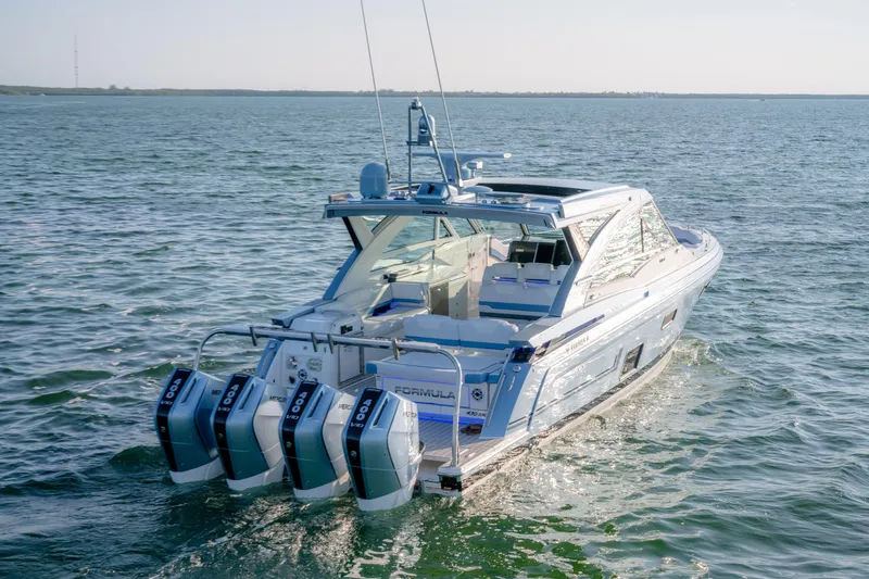 Slide: The Image of 2025 Formula 430 Super Sport Crossover cruising on open water. - 79